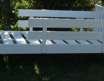 toddler bed in white showing safety railings