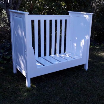 white cot in solid wood