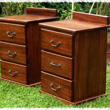 Elegant Kiaat bedside tables with ornate handles showing off the beautiful wood grain