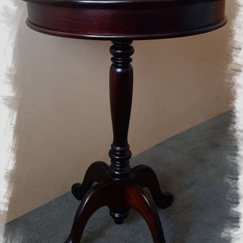 round top occasional table in dark solid timber