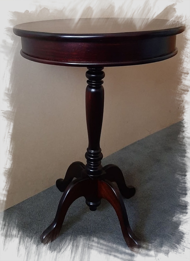 round top occasional table in dark solid timber