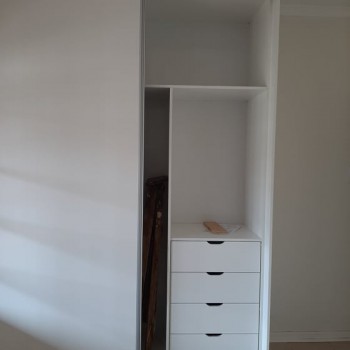 built in cupboards showing storage drawers