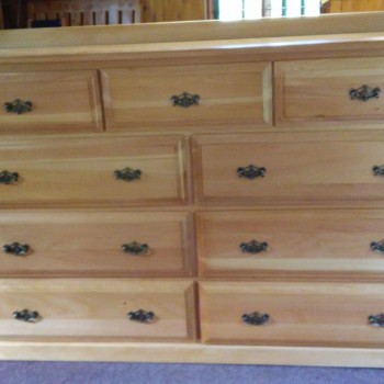 Solid wood chest of drawers with 3 top drawers and 6 larger drawers