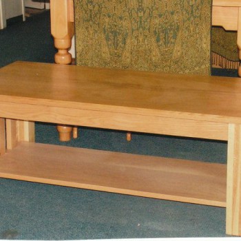 Oak coffee table with storage shelf