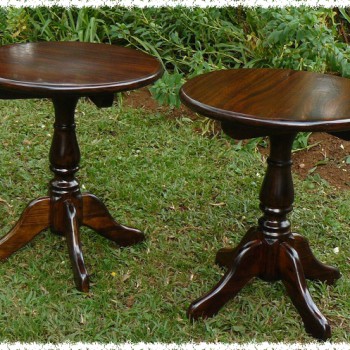 Set of two footed round side tables