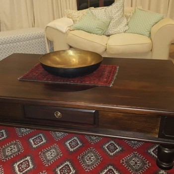 Large dark stained modern coffee table