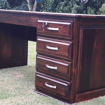 Stained Saligna desk, large and formal, 4 drawers