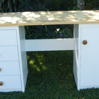 A simple students desk, white and unpainted pine