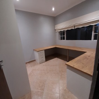 Built-in office desk, Formica top in oak finish