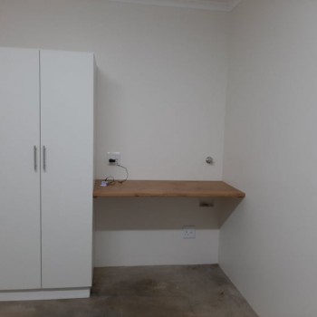 Simple freestanding 2 door cupboard and desk