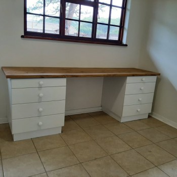 Utility room desk with 4 drawers each side and a solid wood top
