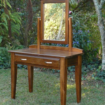Sleek modern dressing table with a large drawer and tilting mirror