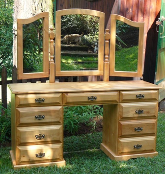 Country style dressing table with two sides of 4 drawers each a 3-sided mirror on top