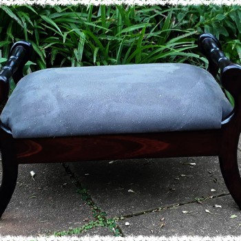 dark wood foot stool with upholstered foot rest