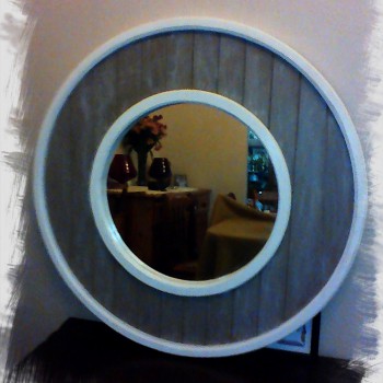 bespoke round mirror with solid wood inlay detailing