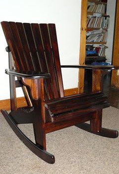 solid wood rocking chair with dark stain