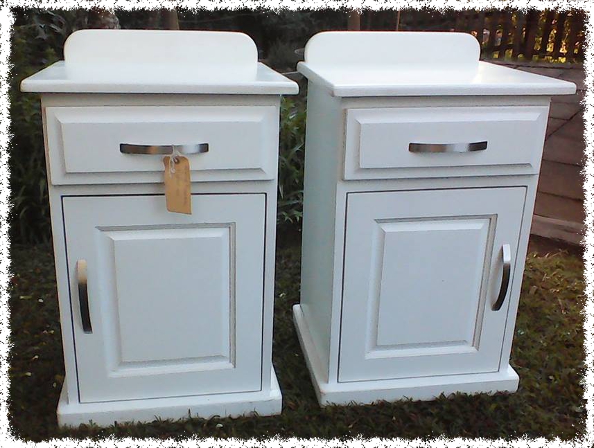 Set of solid timber painted white bedside tables with drawers and cupboard door. Simple yet elegant