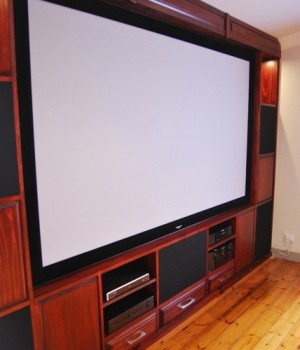 bespoke built-in cinema room in solid timber