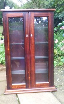Solid wood DVD rack with two glass doors